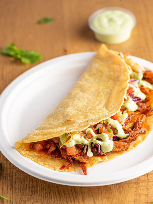 Plated taco served at Tacos Rudos in Budd Dairy Food Hall, Columbus, Ohio