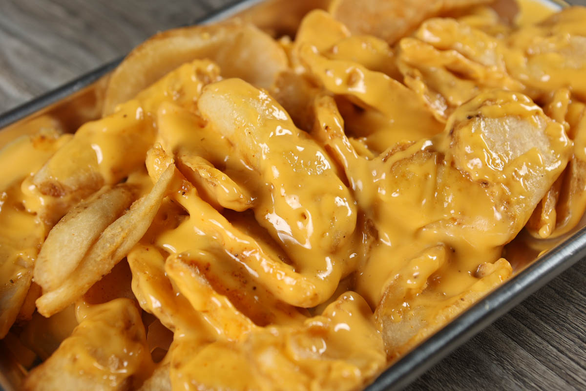 Marlow's Cheeseteaks fries topped with melted cheese