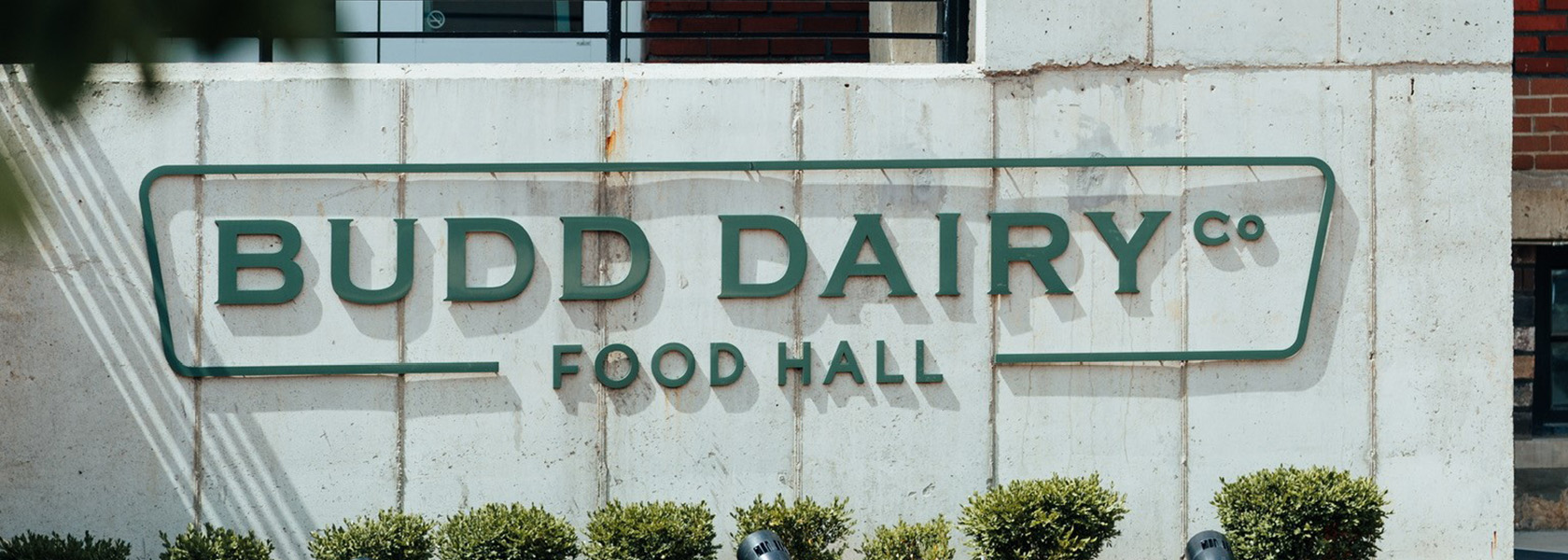 Exterior shot of the Budd Dairy Food Hall sign