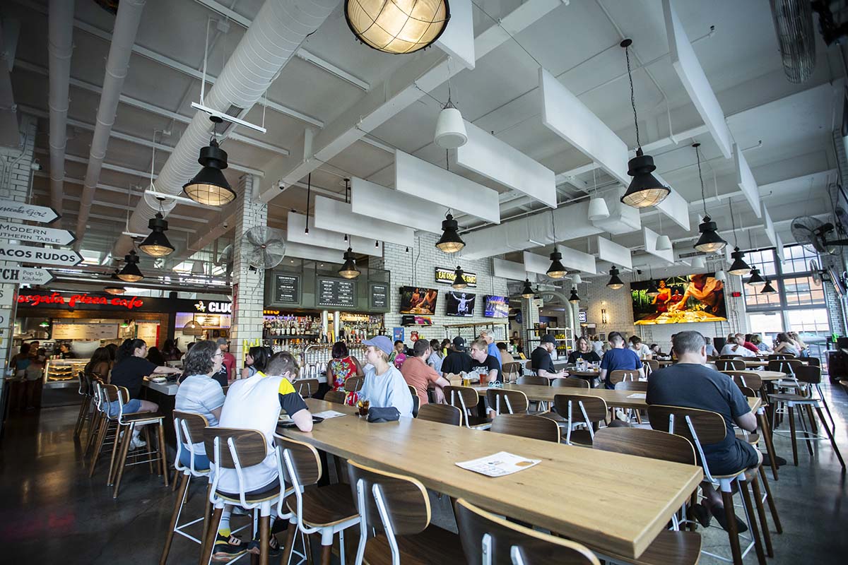 Guests dining in the Community Hall at Budd Dairy Food Hall in Columbus, Ohio.