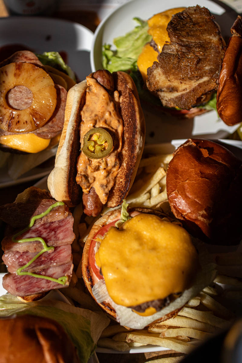 Array of burgers and sandwiches served at Burger Royale at Budd Dairy Food Hall in Columbus, Ohio.