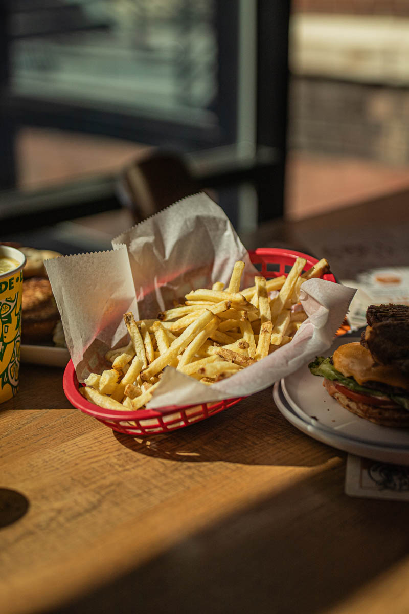 Basket of fries cooked in beef or duck fat served at Burger Royale at Budd Dairy Food Hall in Columbus, Ohio.