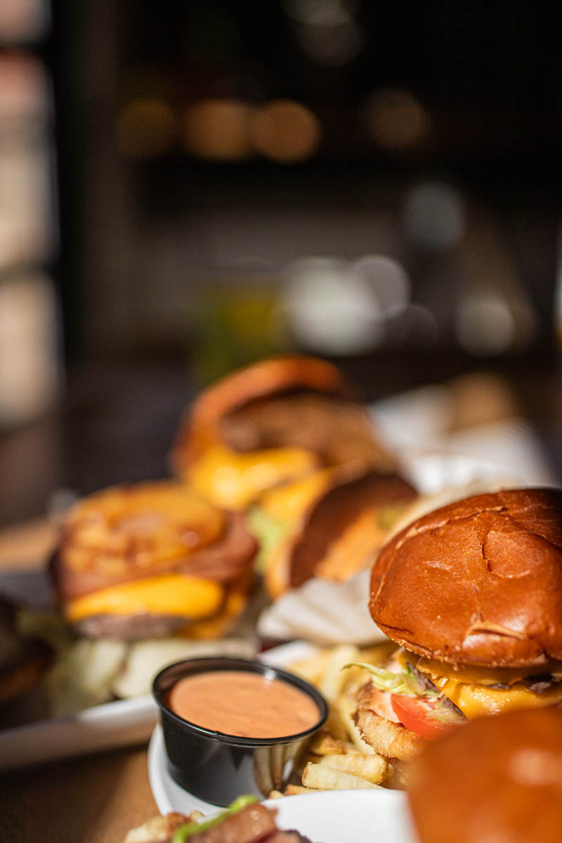 Line up of burgers served at Burger Royale at Budd Dairy Food Hall in Columbus, Ohio.