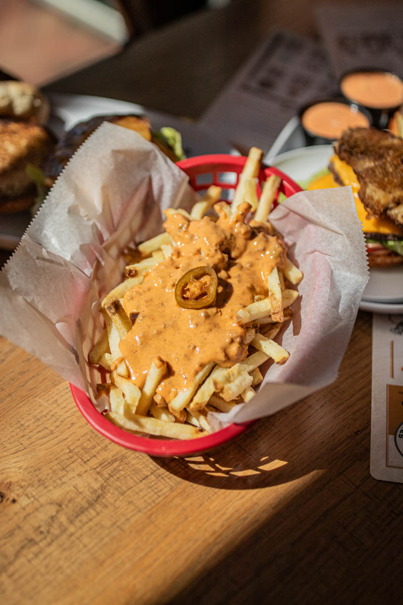 French Fries with cheese sauce served at Burger Royale at Budd Dairy Food Hall in Columbus, Ohio.